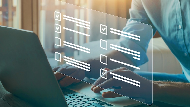 A person checking boxes on a screen