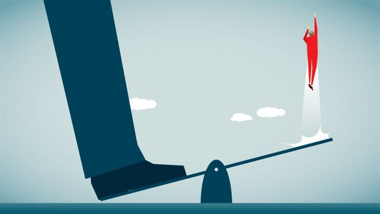 a giant foot propelling a person upwards on a scale