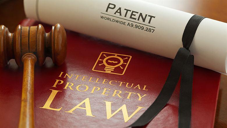 Intellectual Property Law book, patent, and gavel