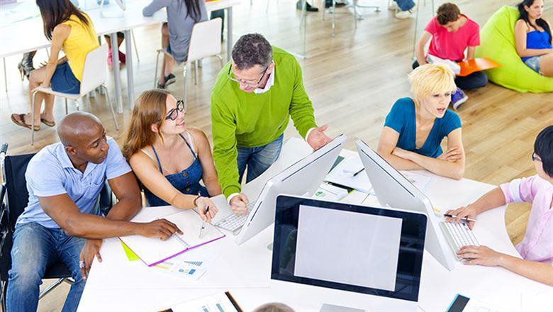 diverse group of professionals working together in an office