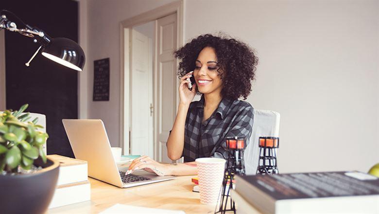 a woman working from her home office
