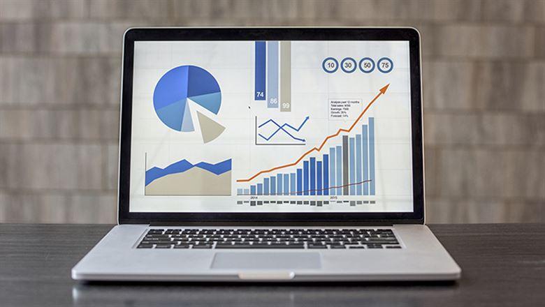 several data graphs on a laptop screen