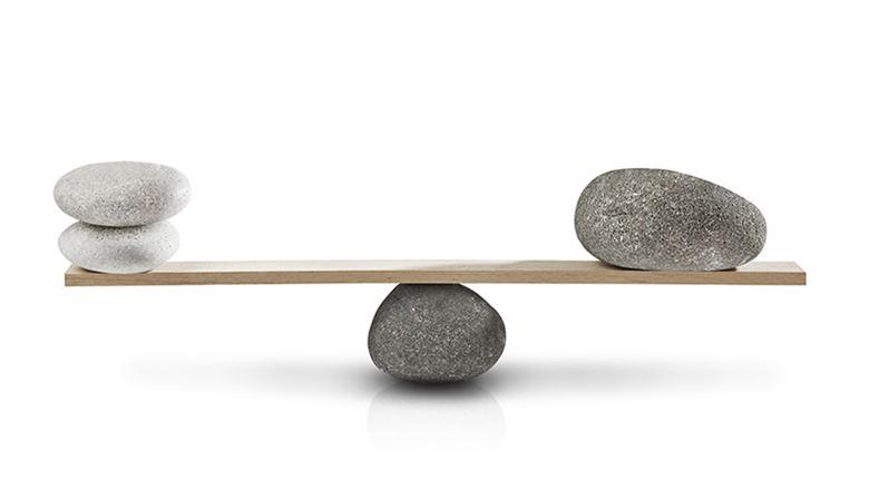 healthy work-life balance, stones balancing on seesaw