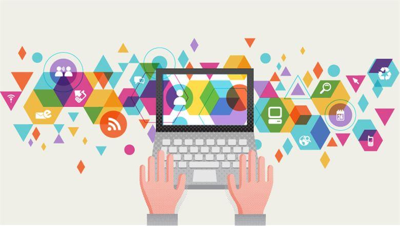 hands typing on computer keyboard