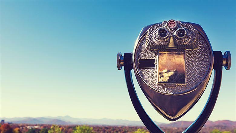coin-operated binoculars looking out over a mountain view