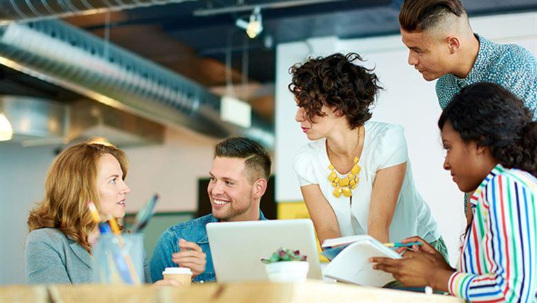 group of young employees meeting