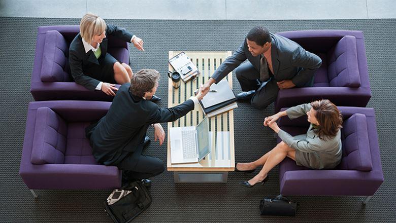 business professionals shaking hands