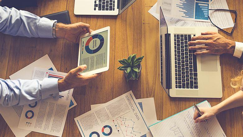 professionals analyzing data together