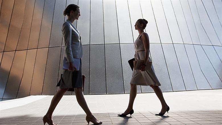 two professionals, one coming, one going