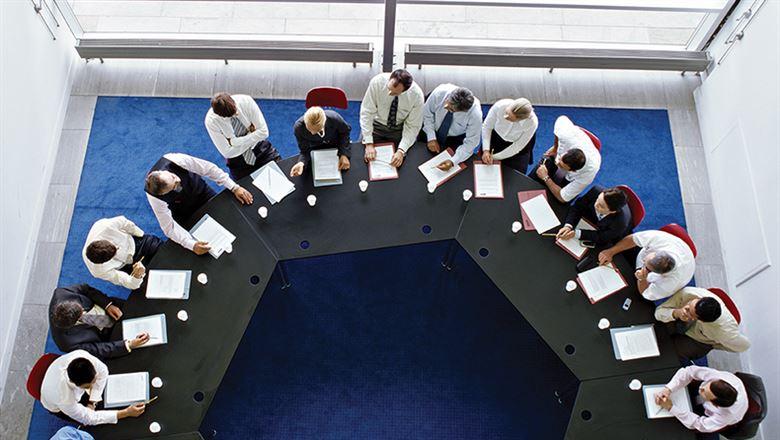 professionals sitting at a round table