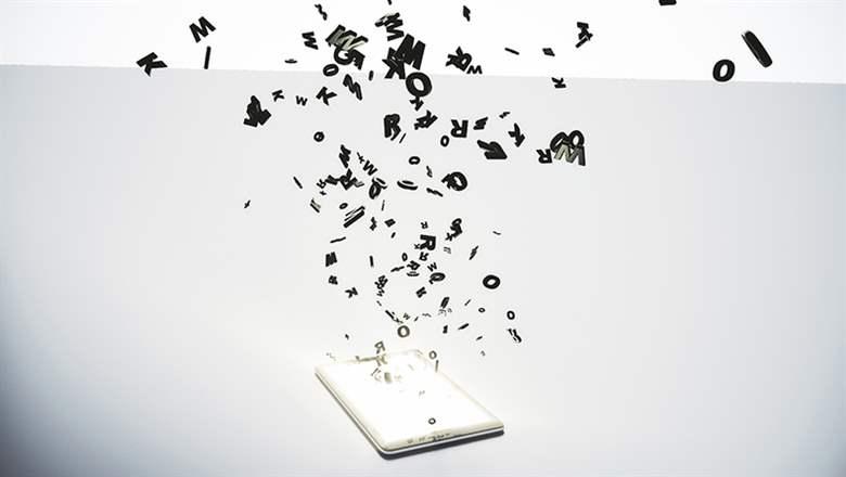 digital text floating out of smartphone screen