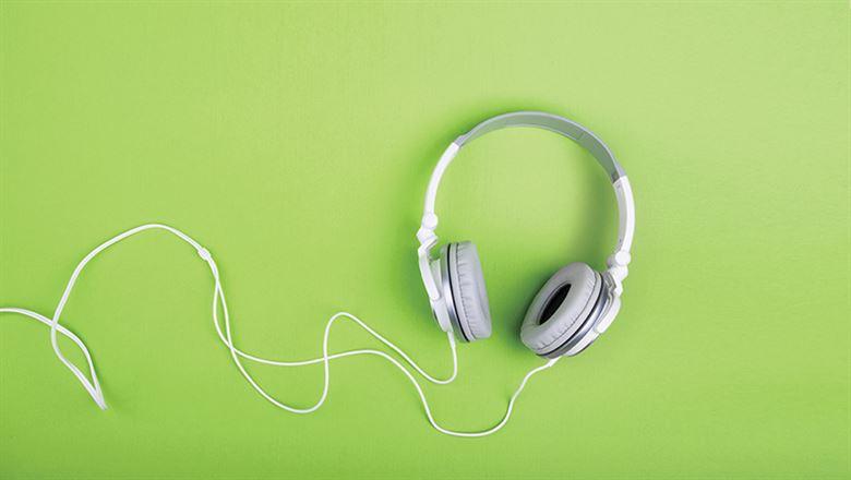 headphones on green background