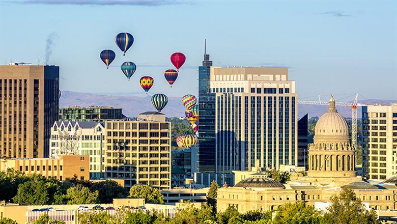 hot air balloons floating over Boise Idaho