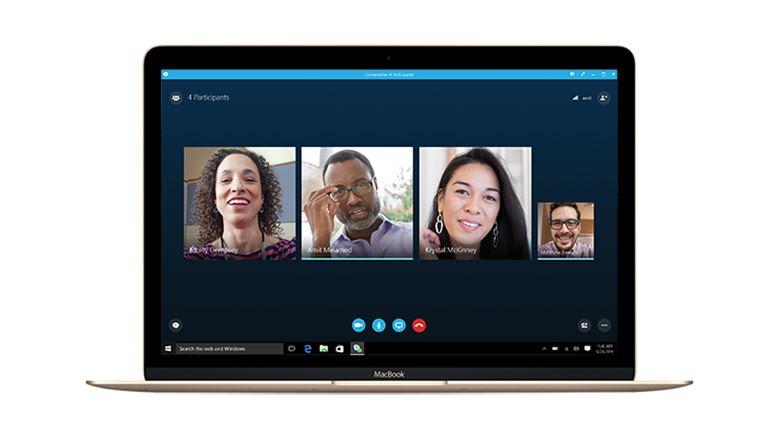 a laptop showing people skyping with each other