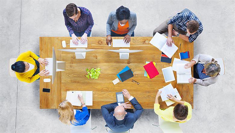 professionals sitting around a table