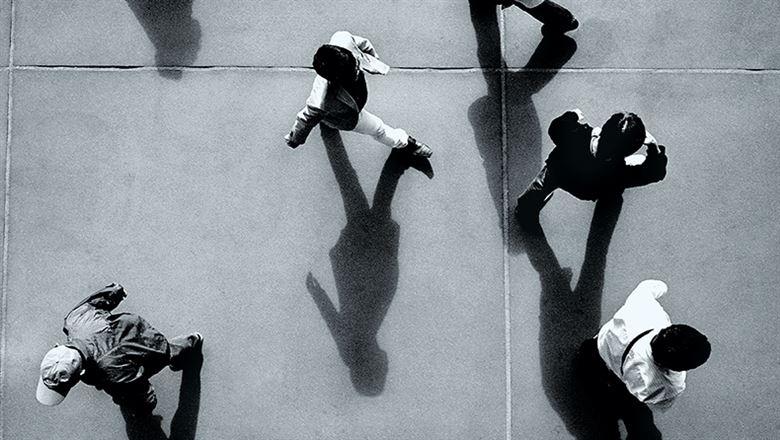 aerial shot of people walking around below