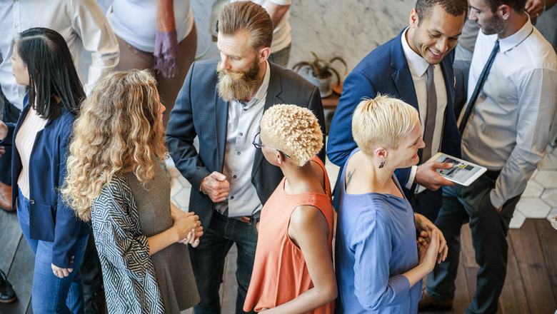 People talking at a networking event