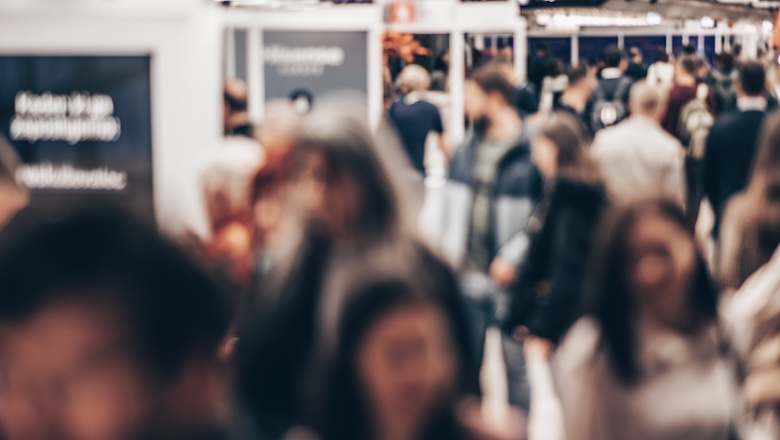 Abstract blurred people at exhibition hall of expo event trade show. 