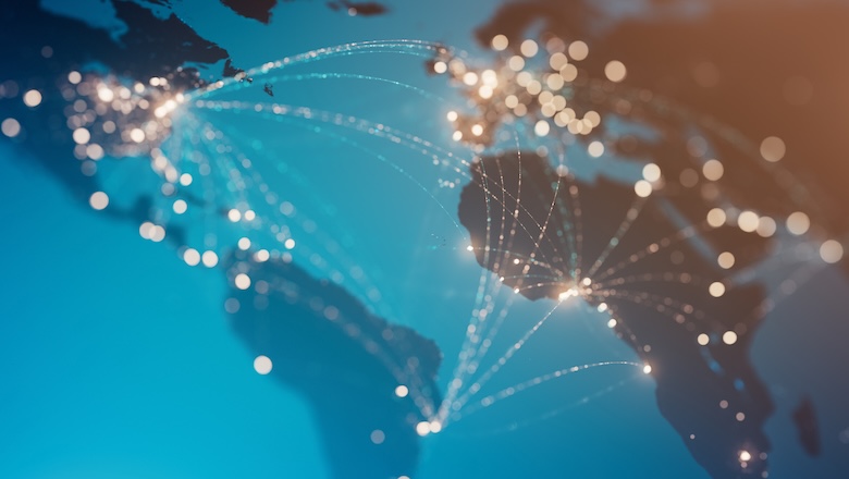 Glowing connection lines between international airports. 3D rendered image created with textures by NASA: