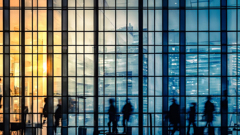 People Work At Office. Buildings Windows With Employees Working Inside. Business, Corporate Concept.