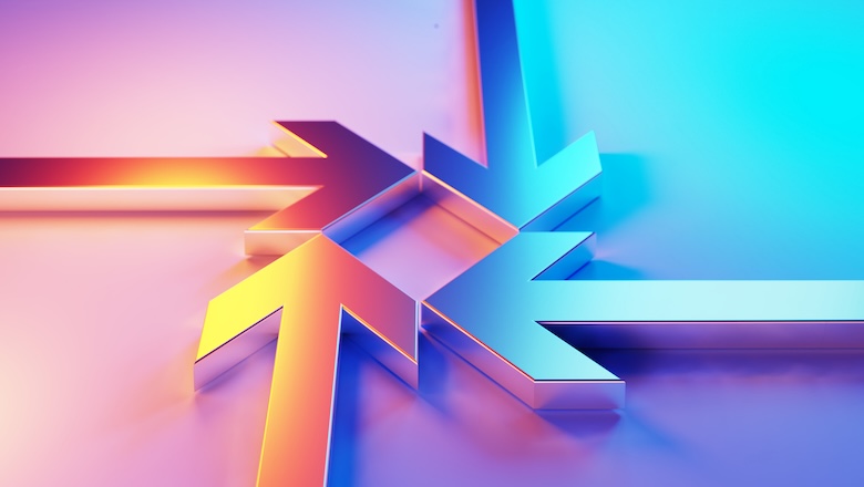 Metallic arrow symbols which are illuminated by blue and magenta lights merge on blue and magenta background