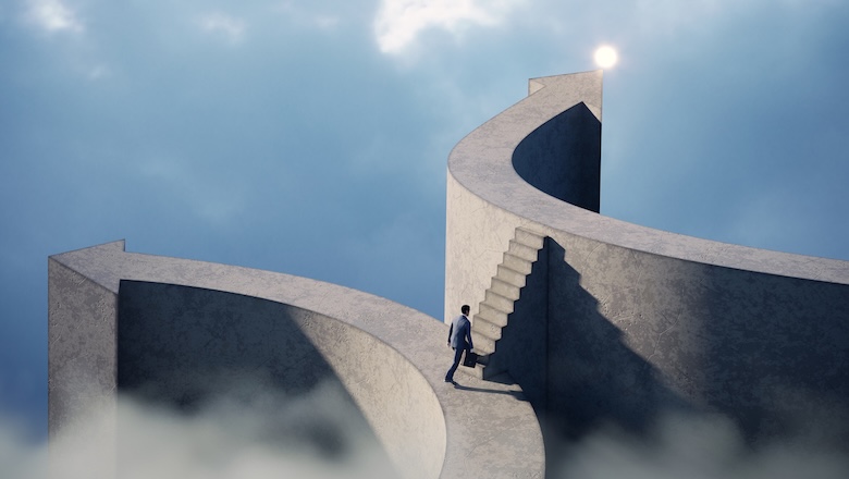 Business man going on arrow shaped bridge to the top light. (3d render).