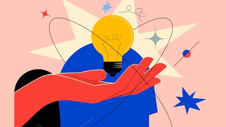 An illustrated hand holding a lightbulb