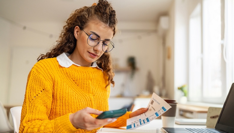 A woman reading financial statements